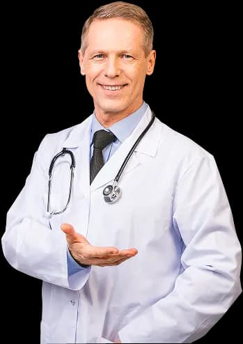 Imagem de um medico branco e cabelos escuros, vestido com um jaleco e um estetoscopio pendurado no pescoço.